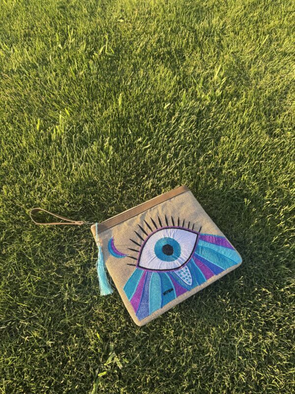 Purple with baby blue Evil Eye