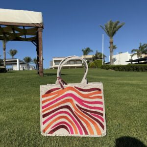 A bold blend of orange, burgundy, and fuchsia.