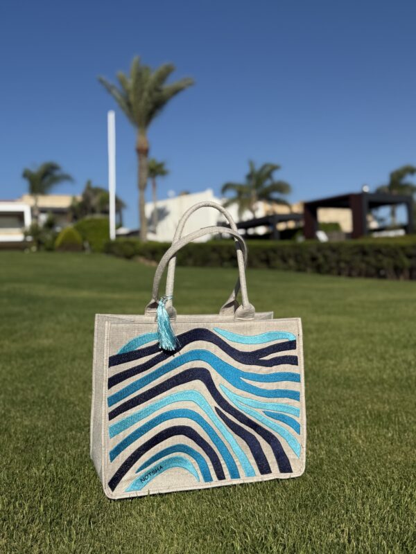 A calming blend of blue tones — from soft sky to deep navy — capturing the cool, effortless vibe of endless summer skies and ocean waves.