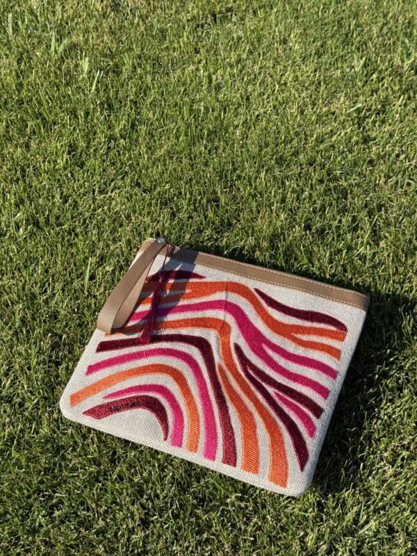 A bold blend of orange, burgundy, and fuchsia.