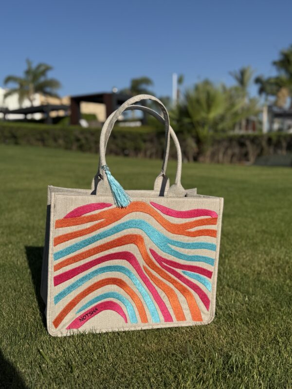 A playful mix of baby blue, orange, and fuchsia