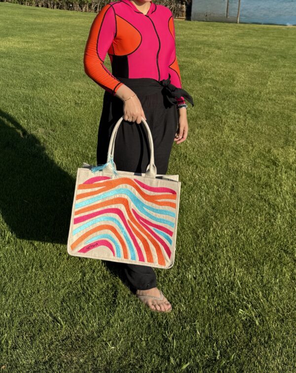 A bold blend of orange, burgundy, and fuchsia. - Image 6