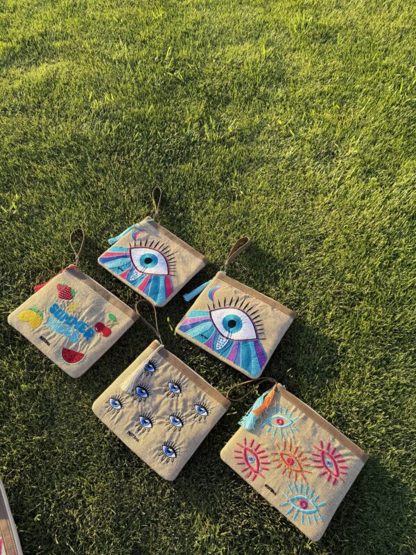 A modern twist on the classic evil eye blending baby blue, orange, and fuchsia. - Image 4